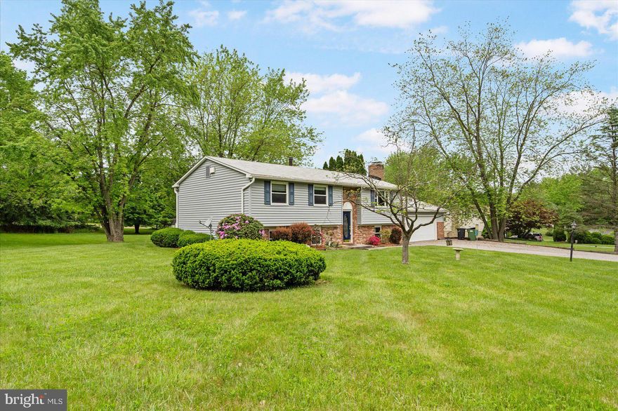 Come see this sprawling Split Foyer offering 3 bedrooms, 2.5 half baths, 2 wood burning fireplaces and 2 levels, with an oversized 2 car attached garage. 

This home offers comfortable living arrangements, while the 2 wood burning fireplaces add warmth and charm.
The kitchen is a delightful space with ample cabinetry and counter space, perfect for preparing meals, opening up to a separate dining area.
Relax in the spacious living room in front of a wood burning fireplace, an inviting spot to unwind after a long day.
The lower lever with the additional fireplace is also an inviting spot to relax serving as a cozy retreat for an evening in, or a versatile space able to handle large gatherings.
 
Walk out the lower-level French doors for the perfect outdoor retreat & grilling area, enjoying the view of the expansive approx 1-acre property! 
Schedule to see this home quicky before it goes under contract!!