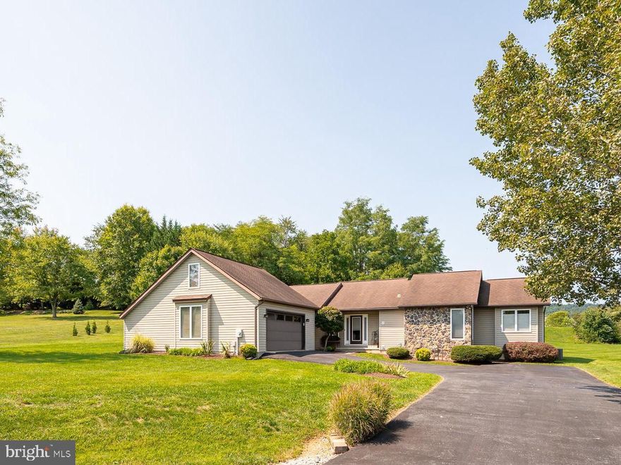 Welcome to your dream home in the picturesque Federal Hills neighborhood! This stunning contemporary rancher situated on 1.24 acres features an inviting open floor plan, perfect for both entertaining and everyday living. As you step inside, you're greeted by beautiful flooring, complemented by large windows that flood the space with natural light and highlight the soaring vaulted ceilings. The cozy family room is the heart of the home, featuring a gas fireplace with a slate hearth—ideal for relaxing evenings. The adjoining dining area seamlessly connects to a well-appointed kitchen, making mealtime a breeze. This home offers 3 bedrooms and 2.5 baths. The primary suite features a generous walk-in closet and ensuite bathroom with a soaking tub. This home is designed for comfort and convenience. Situated at the end of a cul-de-sac, you can enjoy peaceful country living while still being just moments away from major commuter routes. Don’t miss your chance to experience this exceptional property—schedule your showing today!
