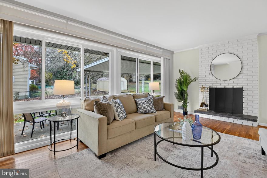 Offers Due 3 PM on Tuesday  12/16. Welcome to your dream home nestled in the heart of Rockville, where classic charm meets modern convenience. This delightful 1955 Cape Cod is a true gem, offering over 1900 square feet of beautifully finished living space. Situated on a fully fenced corner lot, this property promises both privacy and serenity while being directly across from the picturesque and historic Dawson Park, complete with picnic shelters, a tot lot, and nature trails.

As you step inside, you'll be captivated by the abundance of natural light that fills the spacious living areas. The main level features original hardwood floors, while the upper level boasts new carpeting and is graced with a neutral off-white palette, creating a warm and inviting atmosphere throughout. A wall of windows in the living room frames the view outside, complemented by a cozy fireplace and access to a partially covered patio and lawn—perfect for entertaining or enjoying a quiet evening outdoors.

This home offers four generous bedrooms and three full bathrooms across three levels, including a versatile lower-level in-law suite with its own private entrance. The enormous primary bedroom on the upper level is a true retreat, accompanied by two additional well-sized bedrooms upstairs, each featuring new carpeting and walk-in closets for plenty of storage.

Recent updates include a newer roof, hot water heater, electric panel and a new upper-level mini-split HVAC system, ensuring comfort and efficiency year-round. Located in the award-winning Richard Montgomery High School cluster, this home is ideal for families looking to settle in a top-tier educational neighborhood.

Commuters will delight in the convenience of being less than a mile from the Rockville train station and redline metro, with easy access to Rockville Pike, Wintergreen Plaza, and Rockville Town Center, offering fantastic restaurants, retail, and vibrant community events.

This home is prepped and staged for you to move in and start creating memories. Over 30k in recent updates and prepping, Upper level Mini split system, hot water heater, electric panel - 2025
Roof 2023. Don’t miss this incredible opportunity to own in one of Rockville’s most coveted locations. Schedule your private tour today!