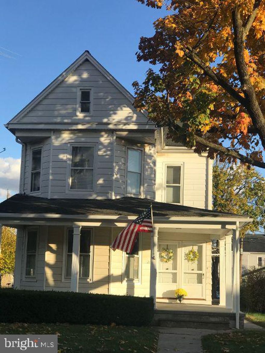 Well maintained 2 unit home with beautiful original hardwood flooring.  Large concrete front porch.  The 1st floor unit is vacant with 2 bedrooms, bath, large kitchen and living room.  Full basement access and laundry facilities included.  Many unique built-ins which optimize the space efficiently.  Entry foyer with closet to large living room.  Formal Dining room with built in break front.  Updated bath with resurfaced tub and tile flooring.  Spacious kitchen with new stove and like-new refrigerator.  Pull out drawers and built ins utilize every inch.  Both bedrooms feature hardwood flooring.  2nd bedroom has built in drawers.  Access to basement which has an outside entrance and laundry room with washer and dryer included.  2nd floor is leased.  Features 1 bedroom, kitchen, bath and living room.  Cute kitchen with original porcelain sink, bath with claw foot tub and surround shower, bedroom and living room have hardwood floors.  Access to attic for storage.  Level yard and off street parking accessed from the alley.  This property has been well maintained by a long term owner.  Could be converted back to a single family home easily.   Move in ready condition.