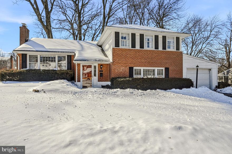 Unique split-level home featuring a true in-law/au pair suite on the ground level, complete with a separate kitchen and full bath. This space offers easy access from either the garage or the family room. The family room also includes an additional half bath and opens to a charming screened porch overlooking the backyard.  The main living area, just a half flight up, showcases beautiful hardwood floors in the living room and dining area. The eat-in kitchen is both functional and inviting, featuring a cooktop, wall oven, and a sink with views of the expansive backyard.  The hardwoods continue throughout the bedroom level and open hallway. This level offers an open hallway leading to the primary bedroom with en-suite bath, along with two additional bedrooms and a full hall bath.  This is a well-maintained home with numerous updates already completed. Features include an attached garage, a new roof installed in 2019, and the central air was updated in 2018. The attic insulation was completely replaced in 2023, improving energy efficiency and comfort. A new furnace installed in December 2025 provides peace of mind for years to come. Located in North Wilmington, this home is close to the Concord Pike (Rt 202) corridor offering plenty of restaurant and shopping options. There are 2 parks in the community.  The schools are part of Brandywine School District and the Brandywine YMCA and the JCC are only minutes away.  Hop on I- 95 and be in downtown Wilmington or cruise up to PA line in no time.  This lovely house, located in popular Graylyn Crest in North Wilmington is a great place to call home!