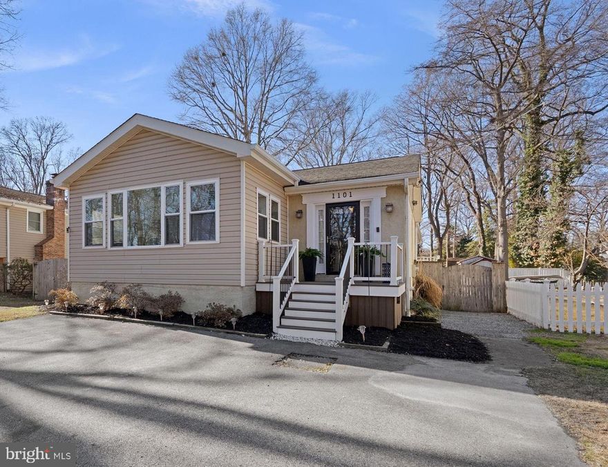 Welcome to 1101 Little Magothy View! Located directly across the street from the water, this home offers a peaceful setting with nearby access for paddleboarding and canoeing, plus winter water views from the front porch. Expanded and updated in 2011, the home features a spacious kitchen with a large island, ample cabinetry, pantry storage, and an open flow to the family room—perfect for everyday living and entertaining. A partially finished basement adds flexible rec space, a workbench area, and abundant storage. Recent updates include newer windows and doors, updated appliances, replaced siding on the addition, and a Trex front deck (2025). The fully fenced yard offers a backyard deck, firepit area, permanent shed, and driveway parking for up to four vehicles. Cape St. Claire amenities include beaches, parks, playgrounds, a boat ramp, and clubhouse access in a quiet, low-traffic neighborhood. Schedule your private tour today!