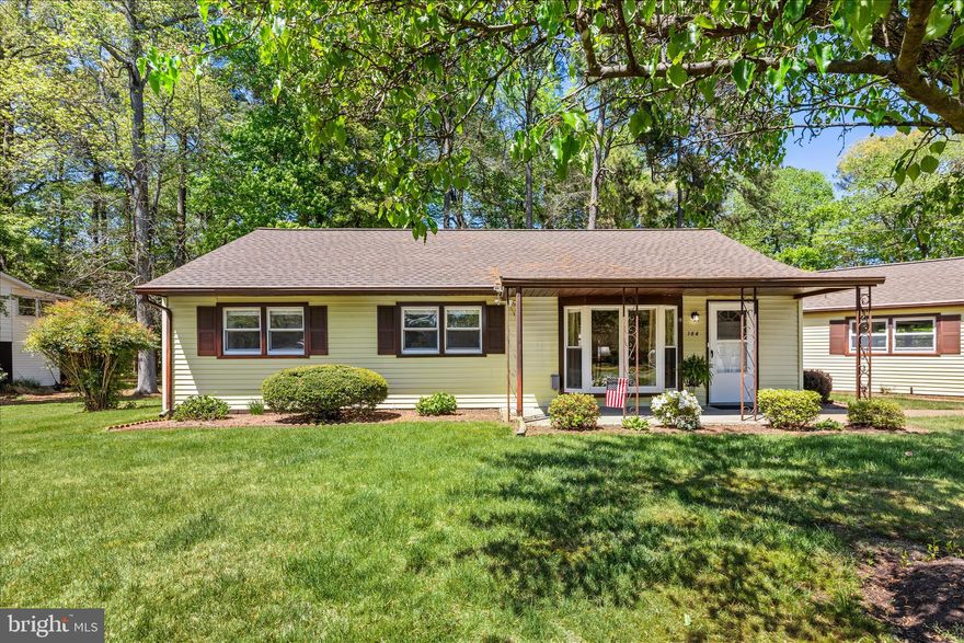 Charming and full of character, this adorable 3-bedroom, 1.5-bath home in Fruitland offers comfort, style, and functionality throughout. A welcoming covered front porch sets the tone, leading into a bright entry foyer and a highly livable, open floor plan. The inviting living room features built-ins, a ceiling fan, and a beautiful bay window that fills the space with natural light, flowing seamlessly into the dining area and kitchen. The kitchen is crisp and modern, showcasing stainless steel appliances, white shaker-style cabinetry, and generous counter space, perfect for everyday living and entertaining. The dining area includes a unique built-in display feature, adding charm and practicality. Neutral ceramic tile flooring runs throughout the kitchen and dining spaces for a clean, timeless look. The spacious primary bedroom offers convenient access to the home’s full bath, while two additional sunny bedrooms share a well-appointed hall half bath. Outside, enjoy a beautiful, tree-lined lot with mature landscaping that provides both privacy and a peaceful setting. A standout feature is the oversized detached garage, connected by a convenient breezeway. This versatile space includes a workshop area and cedar closets, offering incredible potential for hobbies, storage, or additional uses. This delightful home blends charm, functionality, and opportunity, don’t miss it!