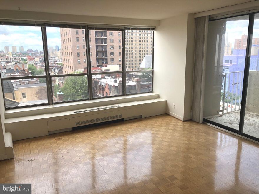 Spacious studio with a private terrace boasting magnificent city views at The Dorchester on Rittenhouse Square! Enter Unit 915A into a sun-drenched open living area with floor-to-ceiling sliding glass doors that open to a private balcony perfect for relaxing with a good book or your morning cup of coffee.  The open kitchen features stainless steel appliances and neutral cabinetry.  A large dressing area/walk-in closet leads to the full bathroom offering a shower/tub and single vanity.   Residents of The Dorchester enjoy a 24-hour doorman, fitness center, all utilities, and basic cable for TV. There is a garage and rooftop pool available for additional fees.