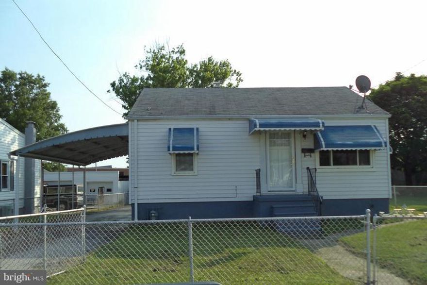 Cozy two bedroom home, finished lower level family room, updated kitchen, bath and windows. Pull down attic stairs for easy storage. Fenced yard, garage and shed.  Property is just steps away from the water!