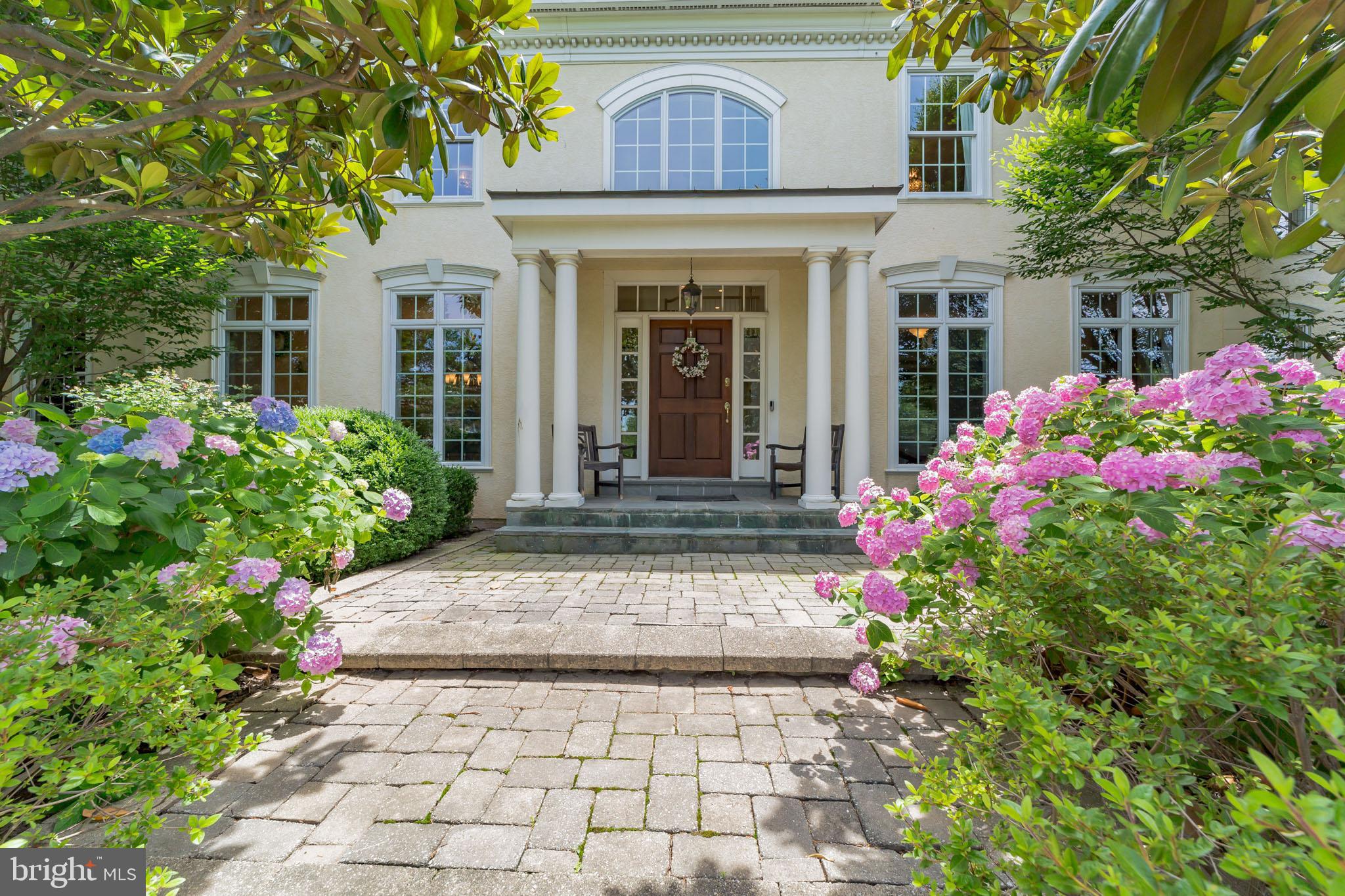 This stunning home located in the coveted Whitegate neighborhood has everything you could want & need. It’s situated on a private, beautifully landscaped 3/4 acre lot. This spacious & beautifully maintained home offers over 7,500ft of finished space. The 2 story foyer displays the open staircase & arched openings that lead to formal living room & dining room. These rooms both offer hardwood flooring, floor to ceiling windows, wainscoting, & lovely crown molding that brings elegance to the space. The living room also includes a wood burning fireplace. Glass french doors with a transom above lead to the magnificent kitchen, which offers many amenities including hardwood flooring, a large center island with barstool seating, beautiful granite countertops, Decora cabinets that provide plenty of storage space, a decorative glass fronted backsplash, & a large walk-in pantry. The space also has a butler’s pantry with display cabinets, as well as a useful desk area. Directly off of the kitchen is the bright breakfast room, floor to ceiling windows on 3 sides provide views to the stunning backyard. Off of the breakfast room is mud room with a side door entrance, custom built in cubbies & access to 3 car garage & powder room. Large center staircases that lead to the 2nd floor & lower level separates the kitchen &family room area while still keeping an open feel. The 2 story family room includes a wood burning fireplace, beautiful arched windows, custom built in cabinets & built in TV case with surround sound speakers. The family room has easy access to the backyard. Glass french doors off of the family room open to the elegant piano/music room, with 2 triple windows that provide the space with wonderful lighting. More glass French doors open to the office/study room. The space includes built-in bookcases, a built-in desk & custom cabinets. It also has closet for even more storage or could be used as a possible seventh bedroom. In addition, there is more stunning built in custom cabinetry between the office & living room. Head up the open staircase, with views overlooking the family room. Double doors open to a foyer entrance that leads into the spacious & elegant master bedroom. This room includes a dressing area with custom built in cabinets, 2 outfitted walk in closets, & a double door shoe closet. The luxurious master bathroom is off of the dressing area & features a large double sink vanity with a water closet, a walk in glass shower, & a large soaking tub for relaxation. Bedroom #2 includes a walk in closet & ensuite bathroom. Bedroom #3 & #4 share a jack & jill style bathroom. Both bedrooms offer walk in closets. Bedroom #5 features custom built-in storage cases, walk-in closet, & ensuite bathroom. The custom, gorgeous & spacious laundry room features countertops with a large sink, built-in cabinets for storage, front loading washer & dryer, a glass tile backsplash, & luxury vinyl tile flooring. The lower level features a large recreational level with windows for an open feel & double doors open to a projection movie theater room. In addition, there is a lower level bedroom & full bathroom, an exercise area with bamboo flooring that flows into a separate area with multipurpose use (office, craftroom, workshop, etc.). The extremely private backyard oasis features a tiered patio with Travertine paving with seating & dining areas. The surrounding shrubbery brings beauty & peace to the space. The backyard also features the french garden area, a custom built in box garden with pea stone walkways, a potting shed, & compost area. In 2017 the owner won the Beautification Award from the Upper Merion Township. The perimeter of the backyard is surrounded by 9ft deer fencing, & a large grassy area has potential for a pool. 3 car attached garage with plenty of driveway space. This elegant and spacious home has so much to offer! Come see it today!