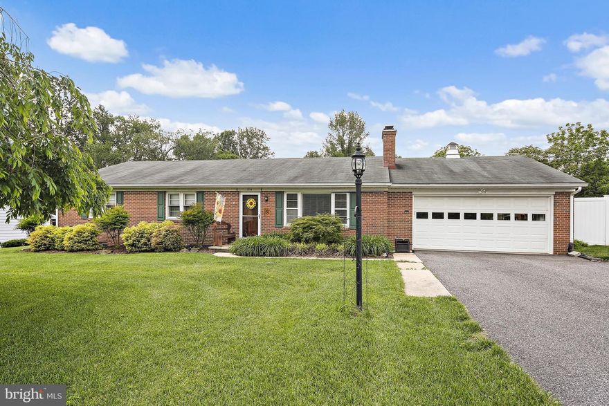 Stunning 3-bedroom, 2-full-bath brick rancher that truly stands out. You'll immediately notice the abundance of natural light throughout the home, highlighting the beautiful hardwood floors. It's clear that the current owner has taken great care of this property, which seamlessly blends traditional charm with modern updates. The bright and airy kitchen features white cabinets, stainless steel appliances, and granite countertops, and it opens nicely to the dining and living rooms, creating a wonderful flow for entertaining. Just off the dining area, you'll find sliders that lead to a lovely, light-filled sunroom and a large, flat, fenced backyard with a storage shed – perfect for outdoor enjoyment. The large first floor laundry room is a plus and makes life easier. The basement offers a cozy and spacious area for entertainment and additional rooms for storage or potential upgrades to office, workshop, home gym or bedrooms. The two-car garage and extended driveway with tons of parking are a nice added bonus.  Also, adding to the appeal, the current owner has recently made significant improvements, including a new oil furnace, A/C unit, well pump, septic line, a beautifully renovated hall bath, and a bright new sunroom.