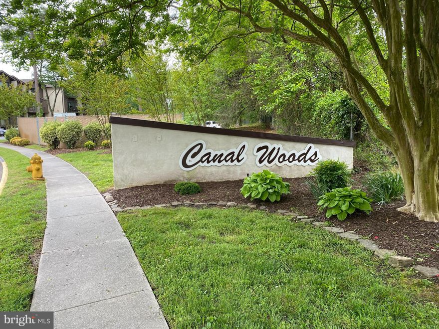 Check out this spacious, first floor, corner condo in Canal Woods!  This unit is just steps from Tony Tank Pond and offers 3 amply-sized bedrooms and 2 full baths.  The appealing open layout flows from the dining area to the living room and even onto the patio when the weather is nice.  The large primary bedroom with en suite bath also has an extra built-in vanity by the walk-in closet.  Renovations were completed in 2018 with new paint and new flooring throughout.  The HVAC was just replaced within the last 2 years.  In addition to common area maintenance and exterior building maintenance, condo fee includes trash removal, water and sewer!  Canal Woods is close to many local amenities and attractions, including Salisbury University, restaurants, medical facilities, groceries, shopping, banking and so much more!  Come see all that this property has to offer and book your showing today!