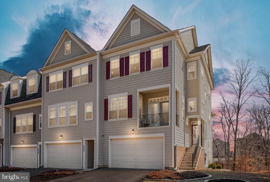 Stunning one of a kind townhome located in the most private section of amenity filled Woodstream! Beautifully maintained home loaded with custom details, wrought-iron railing pickets, custom blinds, and fresh paint. 19' ceilings in the walkout basement with garage and patio access. Full bathroom in the basement with custom shower curtain and upgraded counter and tile work.  Newly treated wood floors throughout most of the main level, crown molding, and wainscoting in formal living and dining area. Gourmet kitchen with granite and upgraded cabinetry with above and below lighting. Stainless appliances, nest thermostat, and surround sound finish out the main level. Upper level boasts large master bedroom with ensuite bathroom. Custom window treatments, woodwork, and an upgraded master bathroom to include floor to ceiling tile, frameless shower and granite upgrades. Two nicely sized bedrooms, additional full bathroom, and upstairs laundry with custom cabinetry complete the top level.