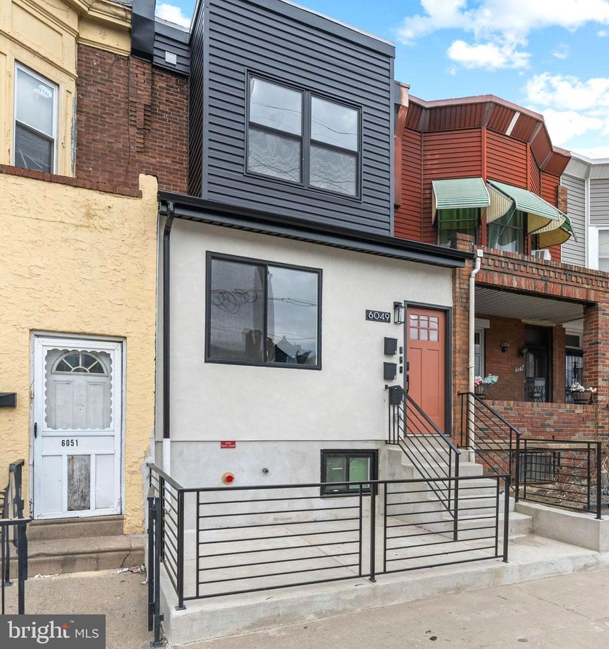 Welcome to 6049 Elmwood Ave, a beautifully updated 3-unit multi-family property offering modern living with high-quality finishes and exceptional convenience. This property features a spacious 2-bed, 1-bath unit with exclusive access to a full basement, in-unit washer & dryer, eat-in kitchen, full stainless steel appliance set, and a large outdoor space, perfect for relaxing or entertaining. Additionally, there are two well-designed 1-bed, 1-bath units, each boasting full stainless steel appliance sets, in-unit washer & dryer, and plenty of cabinet storage including concealed trash and recycling storage. The designer-quality finishes throughout create a modern, bright, and calming aesthetic, making each unit feel both stylish and inviting. While the 1-bedroom units are cozy, they are efficiently designed to comfortably accommodate a single tenant or a couple. Located directly on a major public transit route, this property offers incredibly easy access to Center City and other key work locations, with trolley and bus stops right at the doorstep. Though situated on a main street, the block maintains a neighborly feel without being overly busy, making it an excellent place to call home. The one-bedroom units may also perform very well as short to medium term rentals! If you are investor for a great long-term appreciation AND immediate cash-flow 6049 Elmwood Ave is an outstanding opportunity in a prime location. Disclosure: Agent has financial interest.