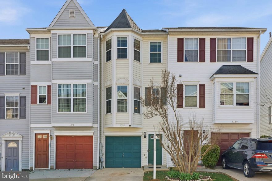Amazing garage townhome in a tucked-away location, yet just steps away from all the conveniences of Frederick's Golden Mile.  PRICED BELOW recently appraised value and comes with a one year Cinch home warranty!  This well-maintained three-level townhouse features a functional and open floor plan, abundant natural light through gorgeous bay windows on two levels, and a fantastic location in the heart of Frederick.   Ground level features an oversized garage leading into a family room/home office and rear exit to a private patio facing trees.  Up one level you'll find a large living room and dining area, half bath and a bright and spacious kitchen with a door leading out to a spacious deck, perfect for enjoying cookouts and relaxing on summer evenings.  The upstairs level features two large bedrooms, attic access, tons of closet storage space and a full Jack-and-Jill bath with dual vanity and separate water closet.  Enjoy townhouse living at a great price, all in a location that can't be beat.  Hurry to see this one before it's gone!