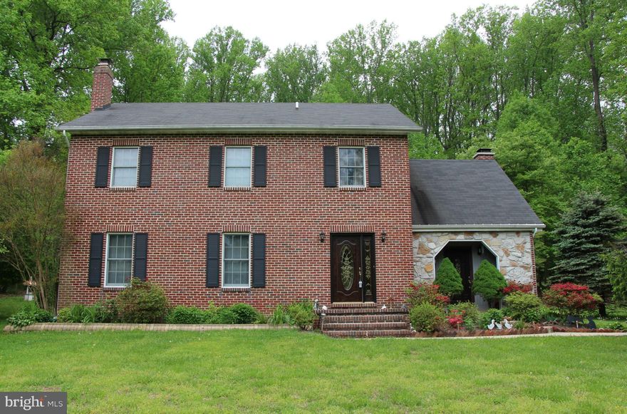 PARADISE DESCRIBES THIS 4 BEDROOM 2 1/2 BATH BRICK/STONE COLONIAL WITH 2 FIREPLACES SITUATED ON 3.56 ACRES.  SERENE FRONT YARD WITH MATURE FRUIT TREES.  BACK YARD OASIS IS LIKE BEING ON VACATION WITH A HEATED INGROUND POOL W/ ATTACHED HOT TUB SURROUNDED BY BEAUTIFUL LANDSCAPING.   YOU DON'T WANT TO MISS THIS ONE!