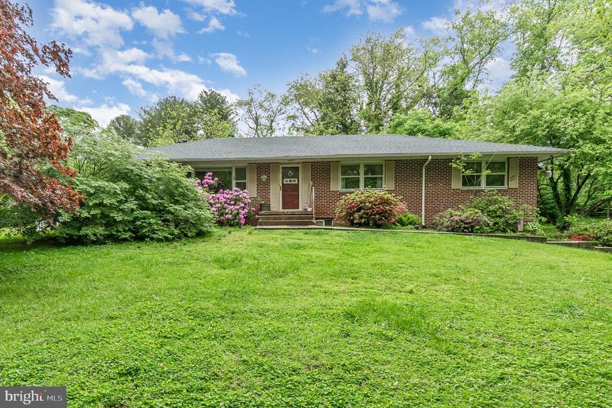 OFFER Deadline set for 4 PM on Monday, 5/12.   Opportunity knocks in Havre de Grace. This 3-bedroom, 2-bath brick rancher sits on a spacious 1.27-acre lot with mature trees and a wooded backdrop, offering plenty of privacy and potential. Inside, the living room features a large picture window that brings in natural light, along with a distinctive stone accent wall that continues into the dining room, where you’ll also find a wood-burning fireplace.
The finished basement adds useful square footage, including a laundry area, a generously sized workshop, ample storage, and access to the one-car garage. There’s also a quiet stone side porch and an above-ground pool out back for future summer enjoyment.  
This home will be sold strictly AS-IS and does need updating, but it offers a solid foundation and room to add value. The price reflects the need for updates.    However, the roof was replaced in 2024.   Located just 10 minutes from the shops, restaurants, and waterfront charm of downtown Havre de Grace.