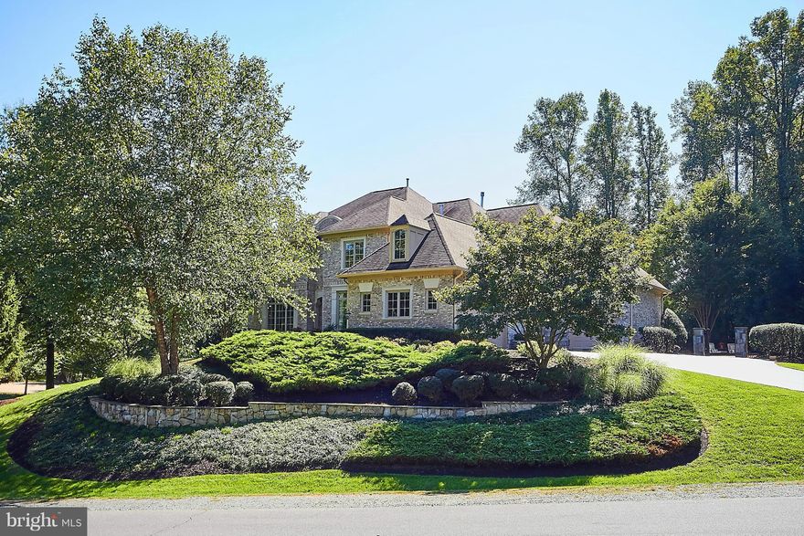 WOW! THIS IS A MUST SEE! WON'T LAST! Resort-style living! Award-winning architectural design. Dramatic 9'+ ceilings on 3 lvls. Magazine-worthy kitchen. Holiday-sized dining rm. Sunbathed family rm. Main lvl library. Conservatory wing. Chic master suite w/ fireplace. Renovated master BA. Spectacular club rm, party lounge, fitness rm, theatre, guest suite & full BA renovated 3 yrs ago! Bkyd paradise