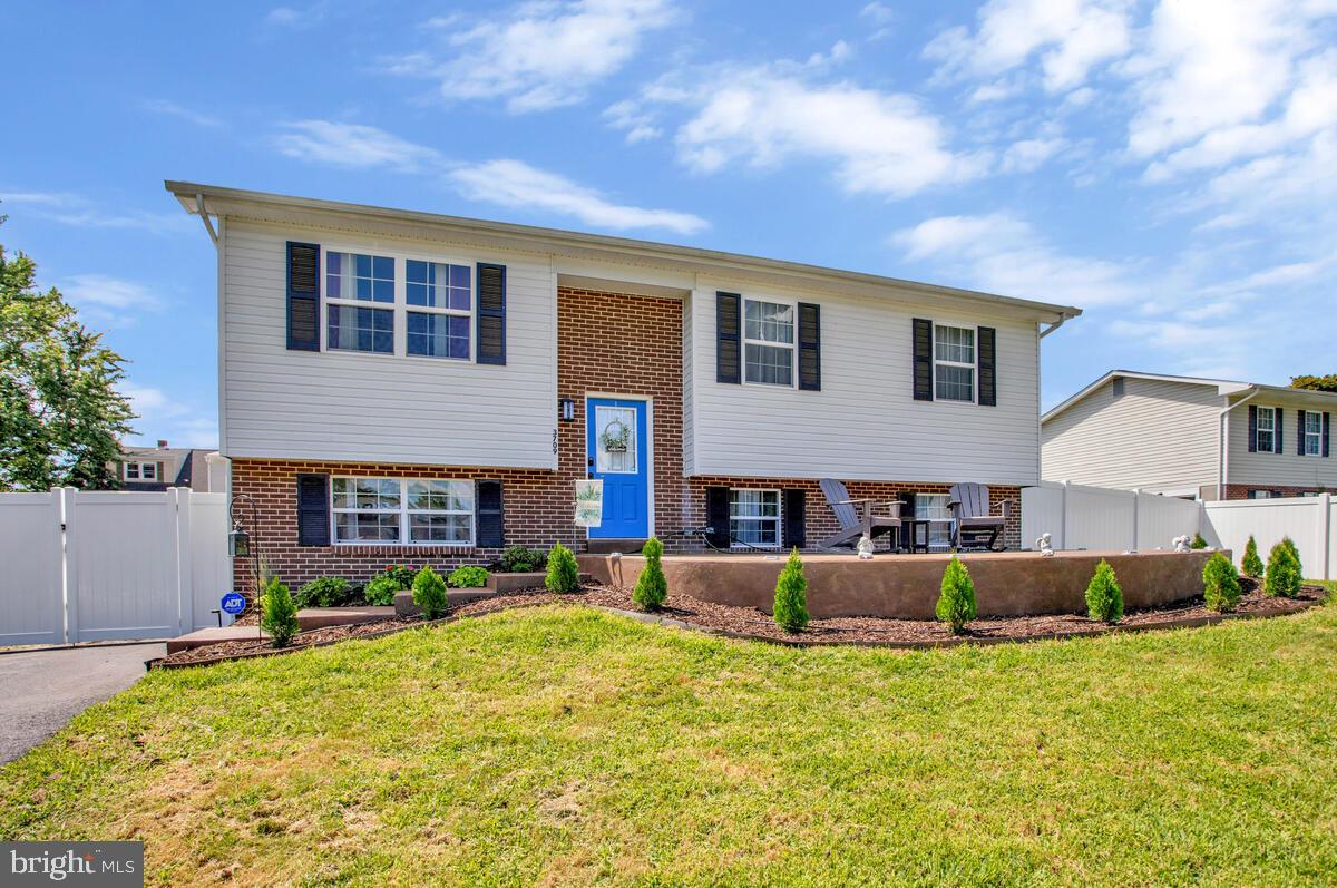 Welcome to your Chesapeake Bay retreat—where comfort, style, and location come together beautifully. Just minutes from the water, with seasonal water views, arrive to this home's front door on the expansive front patio! This pristine, recently remodeled home offers a light-filled, open-concept layout that’s truly turn-key. Step inside to discover gleaming hickory hardwood floors throughout the main level and living room, setting the stage for relaxed elegance. The updated eat-in kitchen features ceramic tile flooring, a center island, classic subway tile backsplash, and a walk-out to a maintenance-free deck—perfect for grilling, entertaining, or simply soaking in the wide-open backyard views. The rear yard is fully enclosed with a vinyl privacy fence and includes an oversized storage shed for all your gear. Upstairs, the spacious owner’s suite boasts its own private full bath, while the additional bedrooms are generously sized and complemented by a beautifully renovated hall bath. The fully finished basement expands your living space with a large rec room ideal for hobbies, movie nights, or game days, plus a convenient slider leading to the flat, fenced backyard. Thoughtful updates shine throughout—inisde and out, from fixtures and fresh paint to moldings and mechanicals—including a newer roof and HVAC system, and extensive landscaping! Located near the charming towns of Chesapeake Beach and North Beach, you’ll enjoy easy access to local dining, shopping, beaches, boardwalks, and marinas. Commuting is a breeze with quick routes to D.C., Baltimore, and Annapolis. Make this home your year-round Chesapeake Bay lifestyle. Select personal items may convey, including the piano, TV, and more.