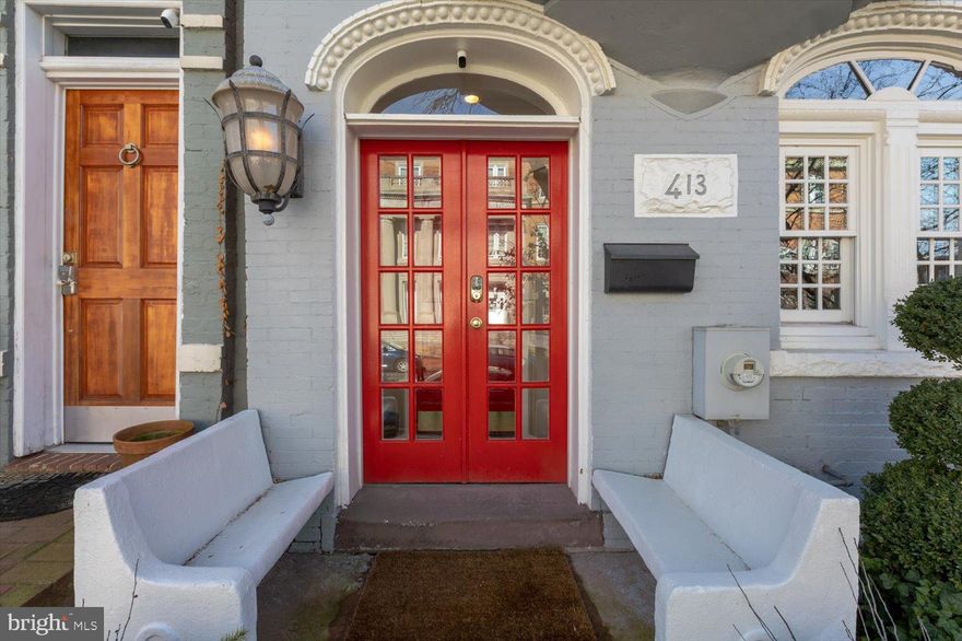 Sophisticated design meets modern comfort to dazzling effect.  Brand new sun-kissed kitchen straight from the pages of House & Garden magazine… rustic brick floors, painted cabinets, subway tile backsplash, marble counters and Viking appliances.  Charming and private rear patio garden for al fresco relaxing and entertaining.  Cozy second story study with custom stone fireplace mantle, bay window and copious built-ins can double as a bedroom.  Second floor landing with antique French doors and exposed brick wall overlooks the garden… a perfect WFH spot.  Updated full bathroom sparkles with white tile and marble.  Full size stacked washer / dryer on second floor.  Two full bedrooms occupy the top floor.  Delightful touches abound in this thoughtfully-curated, ideally located home.  Four blocks to Union Station, three blocks to H Street and a short walk to Eastern Market.