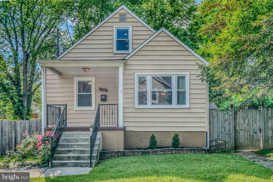 Fabulous Lauraville cape cod with two car parking pad and lovely fenced in yard on a quiet street. Beautiful wood floors throughout main level, gourmet kitchen with Juperano granite and stainless appliances, laundry on main level. Upper level is large bedroom with ample closet space and recessed lighting. Basement is fully finished with half bath, storage and walkout- seller offering a credit for basement flooring (carpet removed due to older dog - choose your own flooring!) Great price for such a cute home!