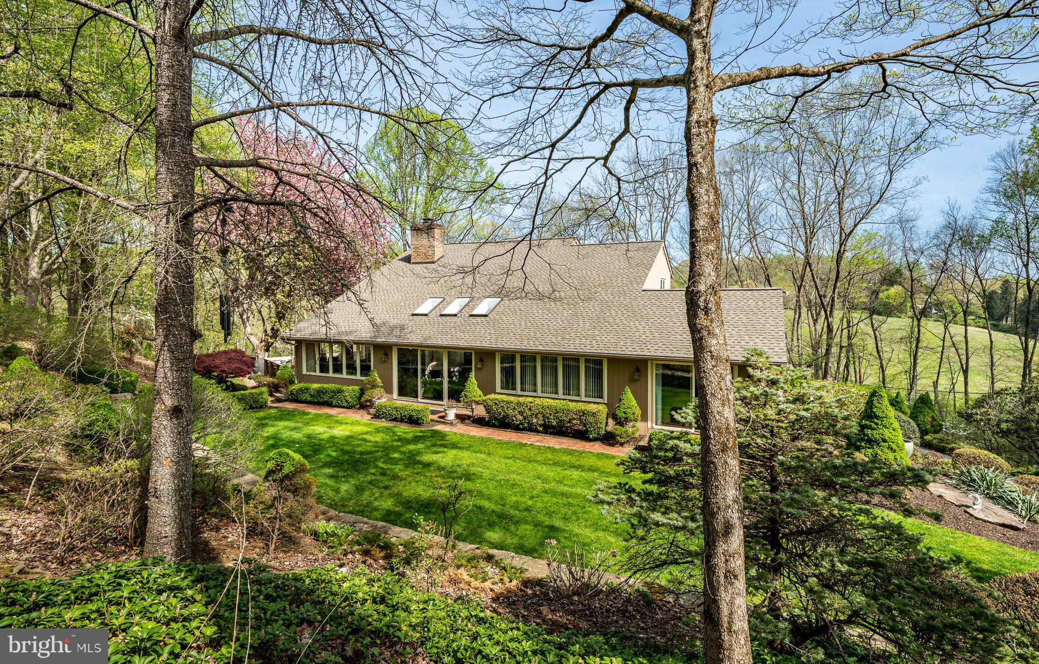 Privately set down a long driveway in a quiet community off of picturesque Parkersville Road, sits this gorgeous, and well kept 4 bed 4.5 bath home on 3+ idyllic acres. The light-filled home has a terrific flow, a well appointed first-floor primary bedroom suite and a fully finished basement. The beauty of nature is fully embraced, both inside and out, with numerous sitting areas and outdoor gathering spaces around the property. Large windows throughout the home provide abundant light in all seasons. Available for the first time in 40+ years, this property has been lovingly and meticulously maintained to the highest standard by the present owners. Located in the sought after Unionville-Chadds Ford School District, 7 Evergreen Ct provides an incredible lifestyle opportunity for the discerning buyer. Showings will begin with the Broker's Open House on Friday, 6/13. Schedule your showing today!