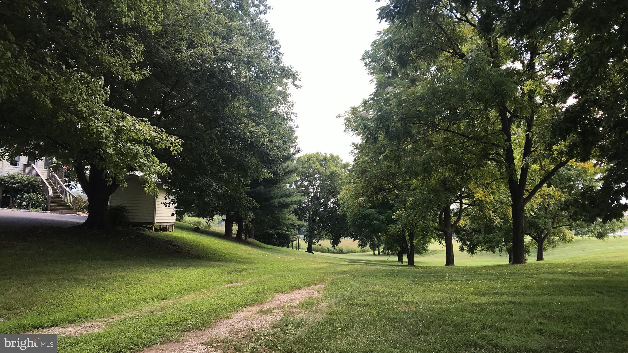 Ideal building lot in a private, quiet setting 6 miles from downtown Charles Town WV. Lot is open, sloping to the east, with beautiful views of the mountains just east of the Shenandoah River. Adjacent Lot 1 (to the south) is offered for the same price.