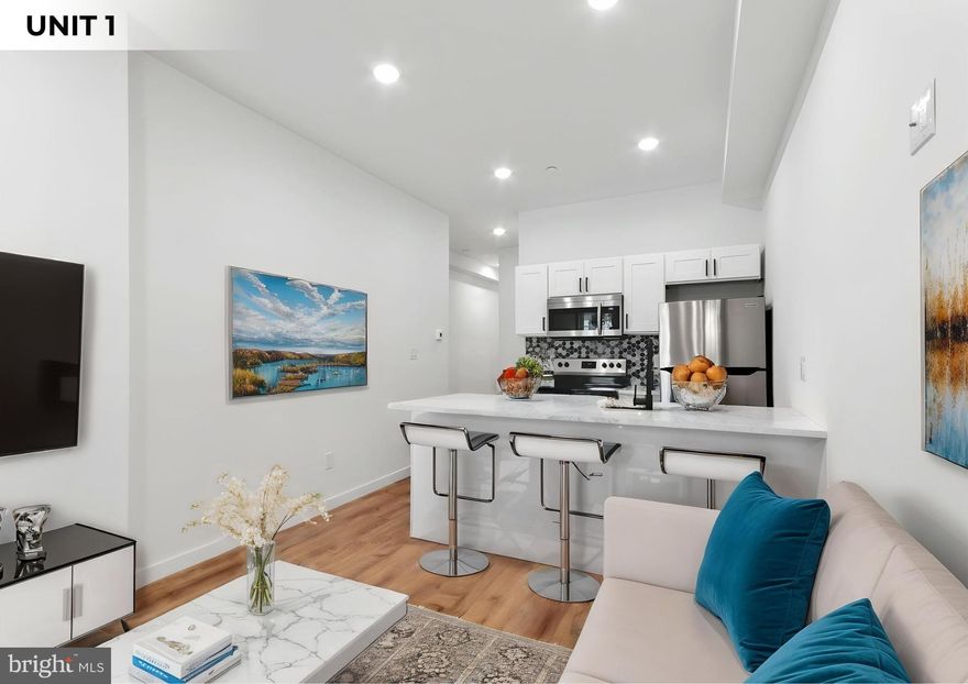 Welcome to 1150 S 52nd Street, a showstopping fully renovated triplex in the heart of booming West Philadelphia. Renovated top to bottom in 2022, this property is a true gem featuring luxury vinyl plank flooring, sparkling quartz countertops, sleek white shaker cabinets, modern matte black fixtures, and stunning tile finishes throughout. Each spacious unit is thoughtfully designed with in-unit washer and dryers, offering both comfort and style. This building is fully occupied with amazing, on-time paying tenants, making it an investor’s dream and still offers fantastic potential for an owner-occupant to move right in and enjoy. Security cameras cover all common areas and the exterior, and a full sprinkler system adds peace of mind. Out back, you'll find a large paved and fully fenced yard, ideal for outdoor gatherings, gardening, or relaxing. Nestled in a thriving neighborhood with tons of development, you're just minutes from public transit including the 52nd Street Station on the Market-Frankford Line, SEPTA bus routes, I-76, I-676, and a variety of shops and restaurants. Pride of ownership shines in every corner of this property. Don’t miss your chance to own a turn-key beauty in one of Philly’s most exciting areas.