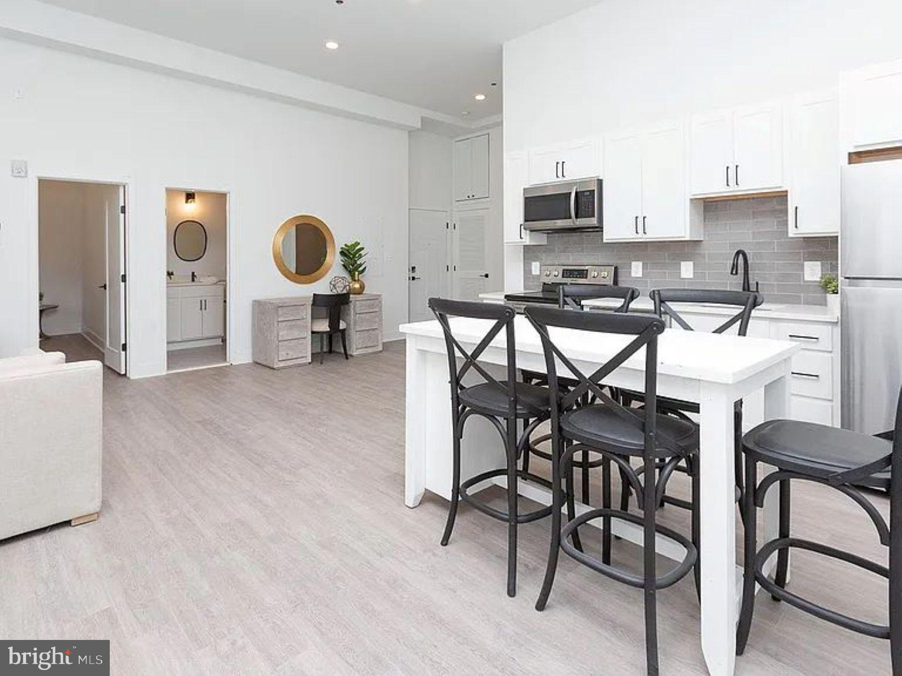 Discover your ideal apartment in The James, where luxury living meets historic charm in the heart of Mount Vernon. Nestled in this picturesque neighborhood, our stunning apartments offer a refined living experience.
Fully remodeled in 2021, these new apartments step into open floor plans with soaring ceilings, creating an airy, welcoming ambiance that's flooded with natural light. Your gourmet kitchen, adorned with sleek stainless-steel appliances and black matte hardware, will inspire your inner chef. The custom walk-in closets, quartz countertops, engineered hardwood flooring, grey subway tile, and posh lighting add more than a touch of opulence to your everyday routine.
Mount Vernon, where suburban serenity meets urban vitality, this lifestyle destination offers a perfect fusion of tranquility and excitement. The community is steps away from Baltimore Penn Station as well as vibrant dining, renowned cultural attractions, lush green spaces, and the prestigious Johns Hopkins campus. Discover Mount Vernon: Your ideal city retreat.
Your oasis at The James awaits, and we are ready to help you find your dream apartment!
The photos are of a model apartment home at The James.