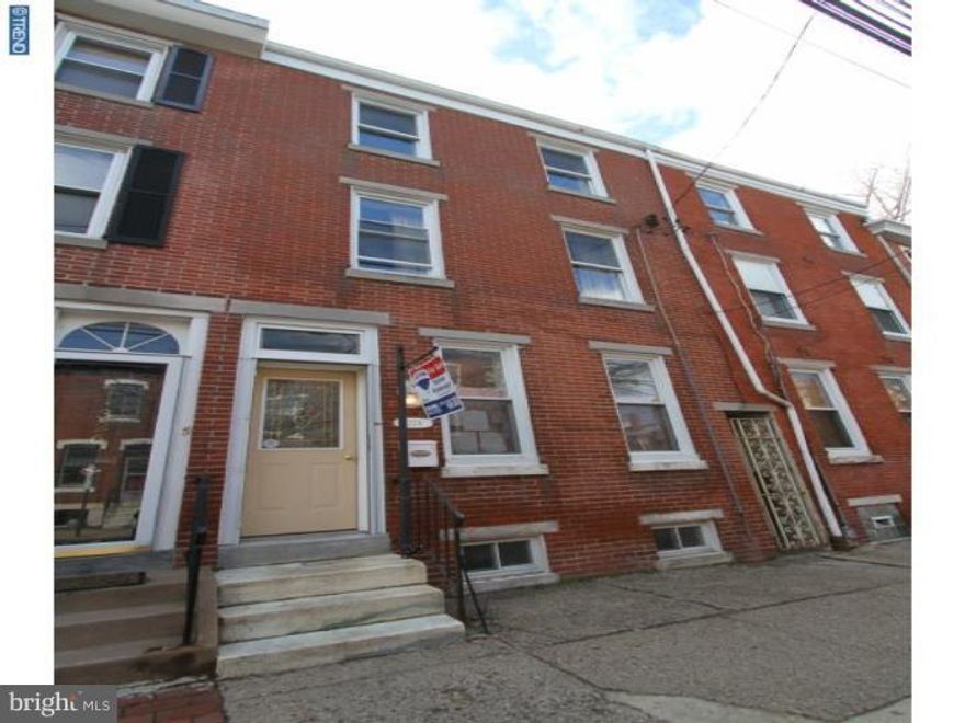This is the one you've been waiting for in Fishtown ! The Wow factor illuminates Through out the entire home! The home has a newer brick front to show the natural beauty of a true Fishtown style house. Walk into the first floor with an open layout living room , dining room combo featuring Brazilian cherry hardwood flooring. Full kitchen with ceramic tile, maple style cabinetry, granite counters & new stainless steel (Frigidaire) appliances. Nice cemented back yard. Second floor features exposed brick in the hall & two larger bedrooms. The back bedroom is a new addition ( adding more sq. ft to the home then what public records recorded)with access to your own private Euro style bathroom with Terrazzo stone flooring & a walk in shower with multi level shower heads, heated towel bars & exposed brick . Both bedrooms feature hardwood flooring & spacious mirrored glass closets. Hall bathroom has a marble surround jacuzzi tub and slate flooring with bonus mounted TV, Euro glass bowl sink. Third floor features your master bedroom with more exposed brick wall, Ceiling fan with exposed beams. Access to the new fiberglass roof deck & wired for surround sound. Basement is freshly painted clean & dry for storage & laundry. Top of the line fixtures T/O. New rubber roofs, Central heating & air. Newer electric. Within walking distance to all Fishtown's cafes & nightlife. Thank you for showing! All offers will be presented !