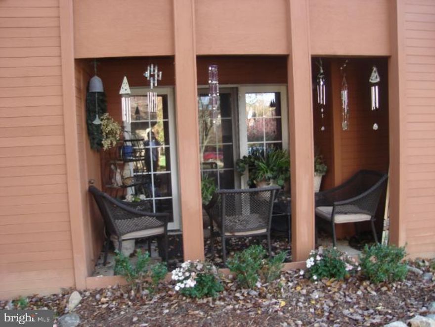 Location,Location,Location for those looking for convenience and quality.  Close to Route 108, Route 29 and Route 100.  Easily accessible amenities through Columbia Association.  Alarm system, washer dryer,brand new carpet & extra  storage area. Outdoor patio on main level adds to convenience.  Well kept and maintained condominium complex. Columbia Mall within 2 minutes. PLUS fresh paint.