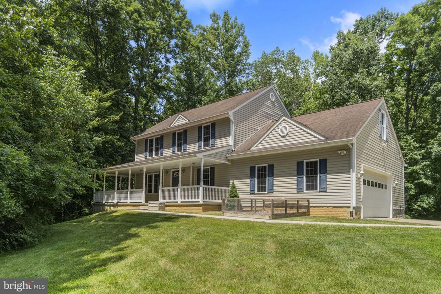 Welcome to 12609 Osborne Dr!  Act quickly.  This is a Rare Opportunity for seclusion while still close to everything!  With the entire property surrounded by mature trees, even in the winter, the feeling of solace permeates the property.  Yet, despite the remote feeling, this unbelievable location is one mile from Riverbend High School and less than 2 miles to Harrison Crossing Shopping Center with Starbucks, Giant and Home Depot.  This custom home has a full wrap around front porch plus an oversized rear deck overlooking the woods and usable yard space - perfect for all of your activities! This oasis has 4 bedrooms (one on the main level) and an oversized bonus room (for a possible office, additional sleeping space, etc) above the garage, 3.5 bathrooms, and boasts over 3,000 finished square feet including a walkout basement with full size windows providing plenty of natural light.  As soon as you pull up the private driveway you have ample parking and play space on the enormous concrete driveway plus an oversized 2-car garage and additional  storage.   Gleaming hardwood floors in many areas of the home.  Cozy wood burning fireplace in the family room and patio door opens to the large, partially-covered entertainer's deck.  The Eat-in Kitchen has a breakfast nook and opens to the formal dining room.  Original owner built this custom home and has maintained it consistently.  New carpet in some bedrooms, fresh paint, recent deck staining, chicken coop and rear storage shed makes this property move in ready for you!