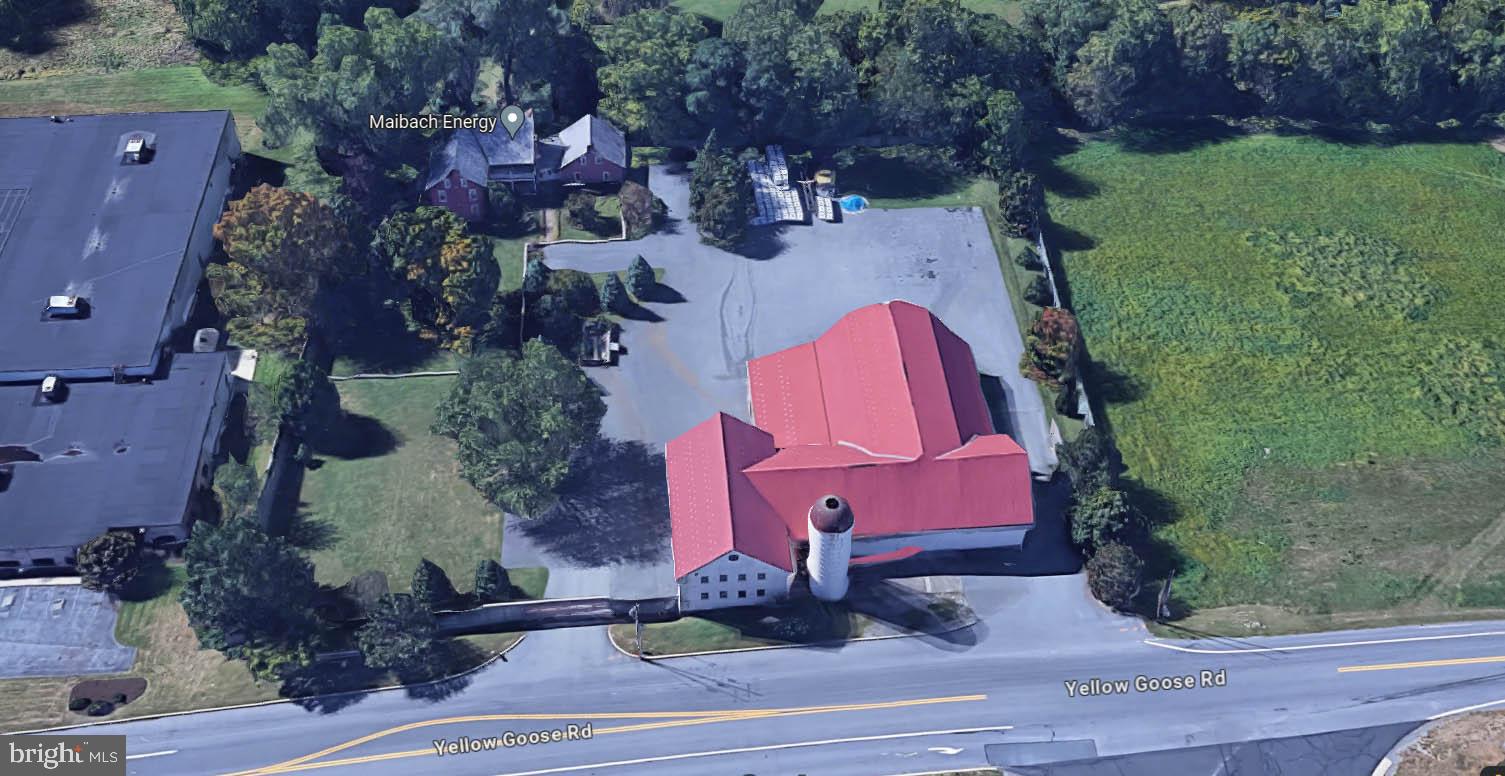 This unique property is situated in the commercially zoned area of East Hempfield Township, adjacent to new Penn State Health Hospital, across from Kellogg plant. It features a historic house and a large commercial building. The house is modern and well maintained, with a large basement and ground floor walkout, as well as a loft apartment over the garage. The commercial building features a 3-story finished office space, large garages with roll-up doors and loading access, and a large barn for storage or warehousing. Perfect for an investor or home business