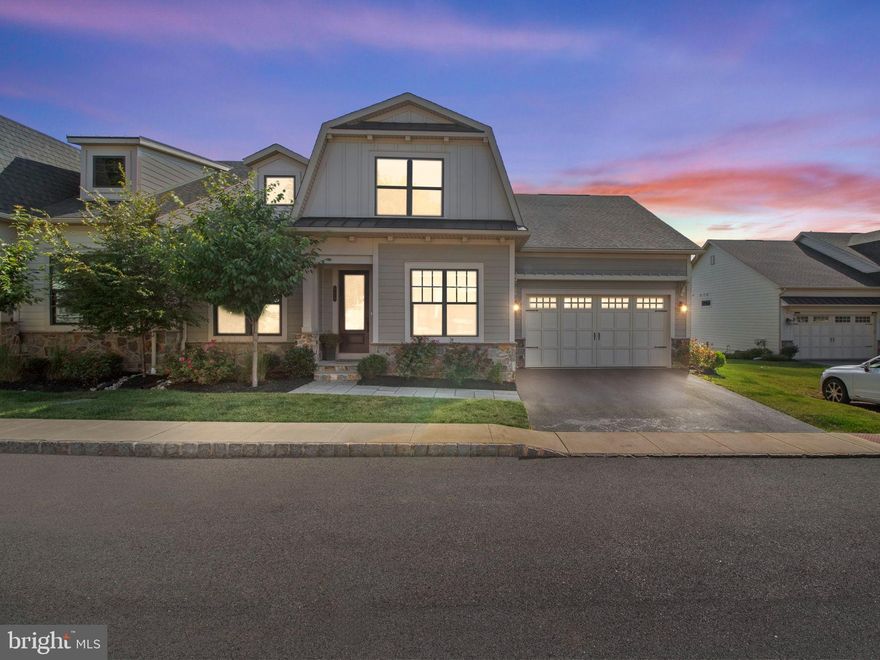 Introducing 320 AP Even Road, a stunning 4-bed, 4-bath carriage home located in the sought-after Tredyffrin/Easttown school district. This NV Homes Bryn Mawr model offers a generous 4514 sq ft of living space in the Wayne Glen Community.

Step inside to discover 10-ft ceilings, beautiful hardwood floors, and a recently renovated kitchen featuring custom cabinetry and top-notch Thermador appliances. The first floor boasts a cozy bedroom, a full bathroom, and a serene primary ensuite with a custom closet. Upstairs, you'll find a lofted area, an additional bedroom, a full bathroom, and a versatile flex room.

Venture down to the basement, where you'll discover a custom bar, a home gym, and a lower level flagstone patio offering breathtaking views of the Glen. This home also includes a two-car garage with custom shelving, an EV charging outlet, and a whole house generator for added peace of mind.

Throughout the house, custom millwork adds a touch of elegance, and the study features custom built-ins for a stunning and functional workspace.

Become a part of a wonderful community that offers low-maintenance living. This property is conveniently located within walking distance of the King of Prussia Town Center and Glenhardie Country Club, and provides easy access to highways 76, 202, and 422 for stress-free commuting. Don't miss out on the chance to make this extraordinary property your new home.