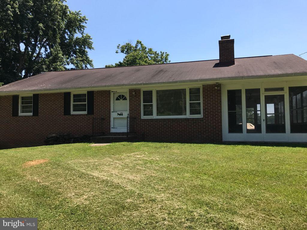 Lovely renovated Rancher on 3 acres in Clarksvile, Easy access to 29 & 32, with New Kitchen, hardwood floors, fresh paint and serenity of Country living. 3BR, 2BA, with fireplace in FR. Separate Garage, NOT INCLUDED in lease but negotiable. Screened porch with glass for year round use.
