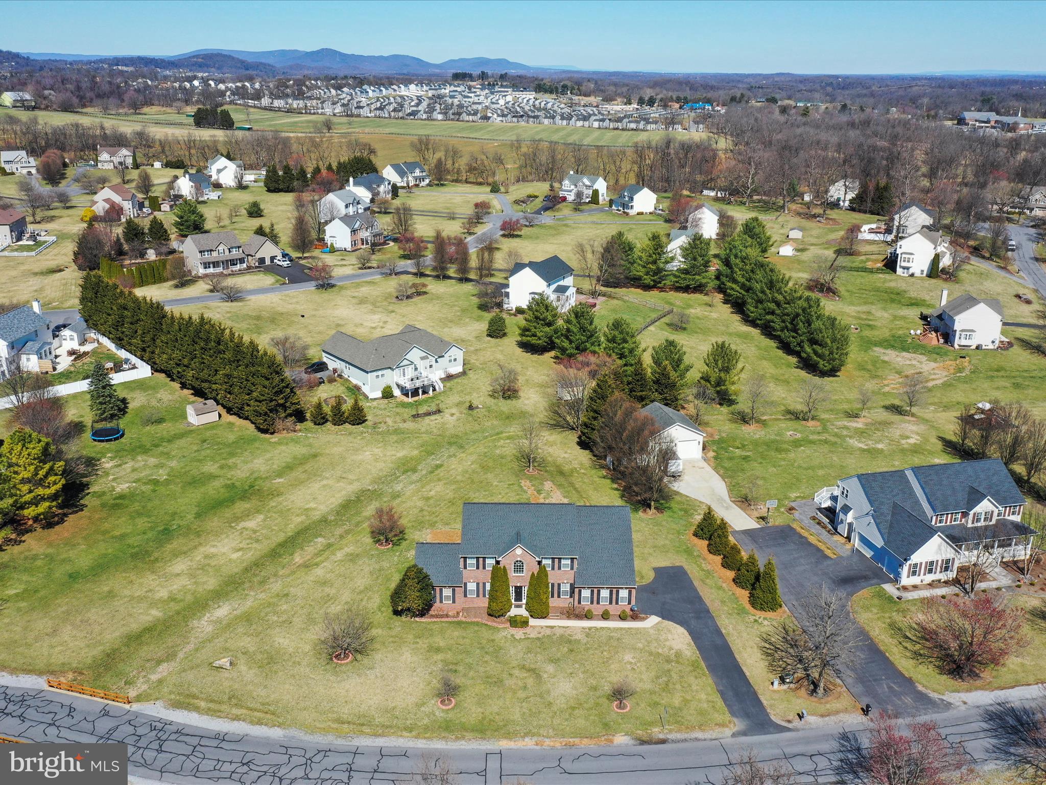 Need up to 8 Bedrooms? Here you have it Bring us an offer!
This is perfect for muti- generational living.
In the highly desirable Harlan Run only 5 - 6 Mins from I-81. Close yet the 1.03 Acre property feels relaxing & peaceful. Hedgesville School District
*Note* All furniture for sale
The septic has been pumped and passed all inspections as well as a radon mitigation fan installed.
Over 5,000 Sqft 5 bedroom, 3.5 bath Sequoia model, colonial home including a HUGE almost 1,500 sqft fully finished basement already wired and plumbed for an In - Law suite or separate apartment that has the potential use of 3 additional bedrooms and 1 full bath.
4 Year old roof, one of the Hvac units is only 3 years old.
A Luxury Primary suite awaits you with tall ceilings arched from 9 - 15 ft. A separate sitting area leading to a balcony where you can leave the door open and let the fresh air just flow throw. The closet in this suite is probably one of the largest closets you've ever seen which leads to the en suite bath featuring a soaking tub, separate shower and double vanity sinks. The upper level features 3 more bedrooms (2) connect to a Jack and Jill bathroom. A stroll down to the main level has many spacious rooms including a Office / Den or could be used as a main level bedroom next to a 1/2 bath.
Kitchen has 42' cabinets, 4 burner cooktop with a griddle, 2 wall ovens, under the granite counter sink, Island, desk / workspace all openly shared with the living room with lots of natural light from the tall windows throughout. w/additional great room addition
Check
This model is nothing short of impressive w/ a great room addition & over 3K chandelier. You need to see to appreciate and add your final home(y) touches.