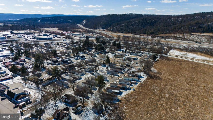 Mobile Home Park Investment Opportunity – Cogan Station, PA

If you’re looking for a stable investment with strong income potential, look no further! This 58-lot mobile home park in Cogan Station, PA, Lycoming Township, is offered at an 8.5% cap rate and features long-term tenants, making it a prime opportunity for investors seeking long-term growth.

The park currently has 35 occupied lots and 23 vacant lots, with a mix of tenant-owned homes (TOH) and park-owned homes (POH). Additionally, there’s an on-site apartment with a garage that generates $500/month, adding to the consistent cash flow.

With a self-managed setup and minimal landlord responsibilities—tenants handle lawn care and snow removal—this property is easy to maintain. Tenants are also responsible for their own trash service.

Property Overview:
This property consists of 58 total lots, with 35 currently occupied and 23 vacant. The stable tenant base includes 23 tenant-owned homes (TOH) and 12 park-owned homes (POH). An on-site apartment with a garage generates $500 per month. The park is self-managed, with tenants taking care of lawn care and snow removal, and they also handle their own trash service.

Financial Highlights:
The total gross income for the property is $22,065 per month, or $264,780 annually. Estimated operating expenses are $54,410.76 per year, leaving plenty of room for strong cash flow and future growth potential. *Rent increase on 15 lots May 2025 @ $50 per lot.

Utilities & Infrastructure:
The park is supplied with well water, costing approximately $500 per month, which is managed by a well operator. City sewer service from the Williamsport Water Authority is $2,100 per month, and the pump house is powered by PPL, costing $200 per month. Tenants are responsible for lawn care, snow removal, and their own trash service.

Investment Highlights:
This property offers a stable income stream with a solid mix of tenant-owned homes and park-owned homes. It also benefits from city sewer service, eliminating the need for costly septic maintenance. The park is self-managed, making it a low-maintenance investment for the owner.

Upside Potential:
There is significant room for growth. Filling 23 vacant lots at $525/month ($12,075/month; $144,900/year additional income). Increase TOH lot rents to market rates ($2,265/month across all lots under $525; $27,180/year additional income).

Located in the R-S Zoning District of Lycoming Township, this mobile home park is grandfathered as a conditional use, ensuring it can continue to operate as it is.

Don’t miss out on this amazing opportunity! Call today for more details or to schedule a tour!