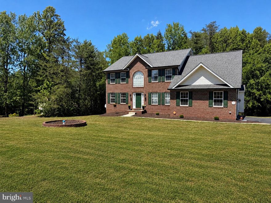 Welcome to 6735 Eastern Hills St in Hughesville offering over 4,800 total sq ft and original owner pride throughout. This 4BR, 2.5BA home features 3,438 sq ft above grade plus a 1,435 sq ft walkout basement with rough-in for full bath.
Bright two-story entry with Palladian window, new flooring and fresh paint throughout. Spacious layout includes a large, inviting kitchen with a generous island perfect for entertaining plus a cozy propane gas fireplace.
Large primary suite with spa-like ensuite.
Major updates: roof (2018), gutters w/ guards (2020), deck refurbished (2026), water system, pressure tank & hot water heater (2023). Shed with newer roof (2018). 
Peaceful setting with easy access to shopping, dining, and commuter routes. Move-in ready with room to grow!
