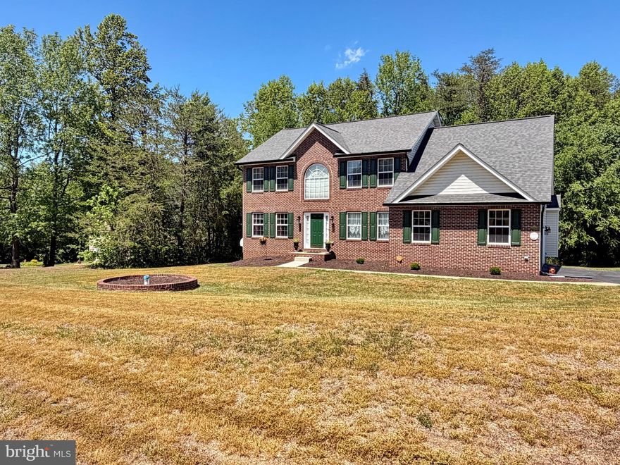 Welcome to 6735 Eastern Hills St in Hughesville offering over 4,800 total sq ft and original owner pride throughout. This 4BR, 2.5BA home features 3,438 sq ft above grade plus a 1,435 sq ft walkout basement with rough-in for full bath.
Bright two-story entry with Palladian window, new flooring and fresh paint throughout. Spacious layout includes a large, inviting kitchen with a generous island perfect for entertaining plus a cozy propane gas fireplace.
Large primary suite with spa-like ensuite.
Major updates: roof (2018), gutters w/ guards (2020), deck refurbished (2026), water system, pressure tank & hot water heater (2023). Shed with newer roof (2018). 
Peaceful setting with easy access to shopping, dining, and commuter routes. Move-in ready with room to grow!