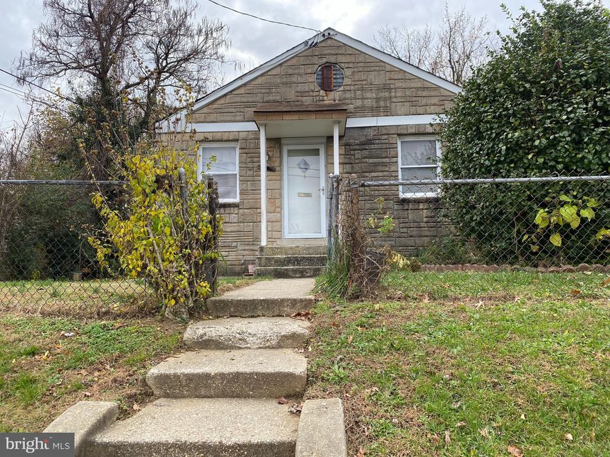 INVESTOR OPPORTUNITY!  Price reflects condition! Ready for your vision!  2 bedrooms, one bathroom, one living room, kitchen. Separate side entrance to unfinished room where water heater and HVAC are. Gas stove. Street parking.  1.1 miles to Deanwood Metro. Pre inspections are welcome.