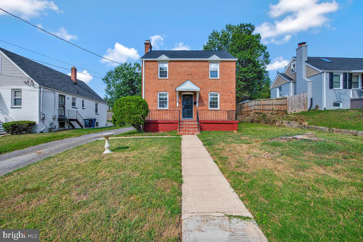 Exceptional 5 Bedroom Brick Colonial with updates to include new appliances. Over 2,538 square feet of finished living space across three levels. New stainless-steel stove, refrigerator and microwave. New roof and air conditioner. New flooring throughout, new kitchen and basement floors. New carpet in all bedrooms. Updated basement bathroom and powder room. Refinished hardwood floors. Nice Den/TV Room next to eat-in kitchen. Washer and Dryer on ground level. Fully finished basement which can serve as a recreation/office or gym area. Off street parking for up to four cars. Large front and back yards, which are excellent for entertainment. Close proximity to shopping, dining, major commuter routes.
Schedule showings through ShowingTime.