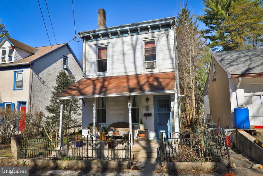 Charming 1890 Farmhouse with Original Details and Modern Updates. Originally built to house farmhands of the early Houston Estate, this detached 1890 farmhouse blends historic charm with modern convenience. The inviting front porch, framed by its original decorative iron fence and gate, sets the tone for this unique home.   Inside, the living and dining rooms feature beautiful hardwood parquet floors.  A convenient powder room is located just off the dining room. At the rear, an updated kitchen provides access to a main-floor laundry room and a large deck—though in need of repairs, so please use caution.   Upstairs, you'll find a spacious primary bedroom, an additional bedroom, and a full hall bath. The third floor offers two more cozy rooms tucked under the eaves, perfect for extra bedrooms, a home office, or creative space.   The full basement houses the home’s mechanicals and a newer hot water heater. There are also replacement windows throughout. Outside, an oversized garage and a side dirt driveway offer ample parking and storage.  Please ​note that the house is served by an onsite septic system​ and that the house is being sold As-Is. ​   Located near Wissahickon Park, the Schuylkill Nature Center, and the Andorra Shopping Center, this home is also close to the shops and restaurants of Manayunk, Chestnut Hill, and Roxborough. Schedule your showing today and please don't let the cat out.
