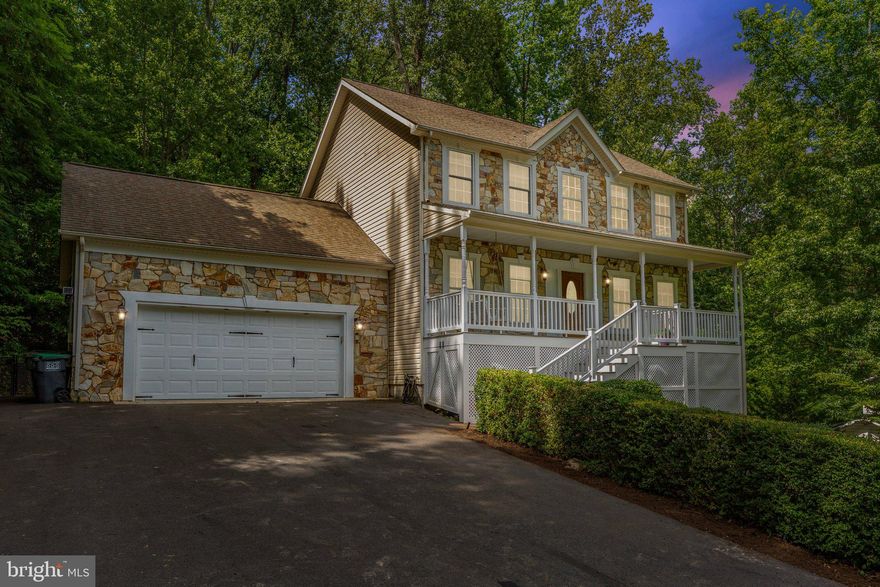 Welcome home to this stunning 4-bedroom, 3.5-bath residence, where elegance meets comfort. Gleaming hardwood floors, detailed crown molding, and fresh paint flow throughout the main level, creating a warm and inviting atmosphere. The gourmet kitchen is a chef’s dream—featuring granite countertops, stainless steel appliances, a farmhouse sink, and striking stone wall accents that add a touch of rustic charm.

Upstairs, retreat to the spacious owner’s suite complete with, dual vanities, and a luxurious oversized tiled walk-in shower. Generously sized secondary bedrooms offer plenty of room for family or guests.

The fully finished basement is an entertainer’s paradise, showcasing a custom bar (that conveys!), expansive living space, and endless potential. Enjoy peaceful outdoor living with a secluded backyard oasis and BEAUTIFUL stamped concrete that wraps around the home—ideal for entertaining or relaxing. The low-maintenance front porch adds the perfect touch of curb appeal and charm.

Note: 4th bedroom is NTC (no egress window).