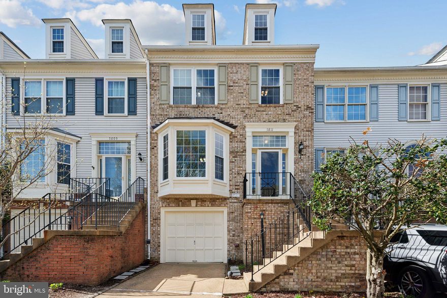 Welcome to this stunning four-level townhome in the sought-after Kingstowne community of Alexandria! This spacious home features brand-new windows (2023), rich hardwood floors, and an updated kitchen with a walk-in pantry. The adjoining breakfast area opens to a large deck, perfect for entertaining.
Upstairs, enjoy new carpeting (2023), a luxurious primary suite with vaulted ceilings and a loft with skylights, plus a spa-like bath with a soaking tub and separate shower. Two additional bedrooms and an updated bath complete the upper level. The lower-level recreation room boasts a gas fireplace, a walk-out to the fenced paver patio, a full bath, laundry, a hot tub in the back yard and garage access. With over 2,400 sq. ft. of living space and access to Kingstowne’s top-tier amenities—pool, trails, lake, tennis courts, and playgrounds—this home is a must-see!