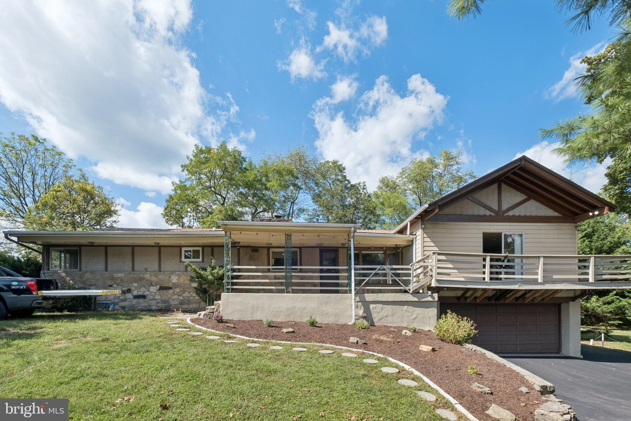 This beautifully renovated 5-bedroom home offers modern updates and plenty of space in the award-winning Rose Tree Media School District. Features include a new kitchen, new flooring throughout, updated HVAC, two fireplaces, and an oversized master suite with a walk-in closet, soaking tub, shower, and dual vanities. The main level includes two large bedrooms, a full bath, a spacious living area, and access to a wraparound deck and patios, while the finished lower level provides an additional living area with two more bedrooms and bathroom. A mudroom/laundry leads to the two-car garage. Additionally there are new bay windows and a freshly paved driveway completing the upgrades. Conveniently located just minutes from downtown Media and major highways, this home won’t last long—schedule your showing today!