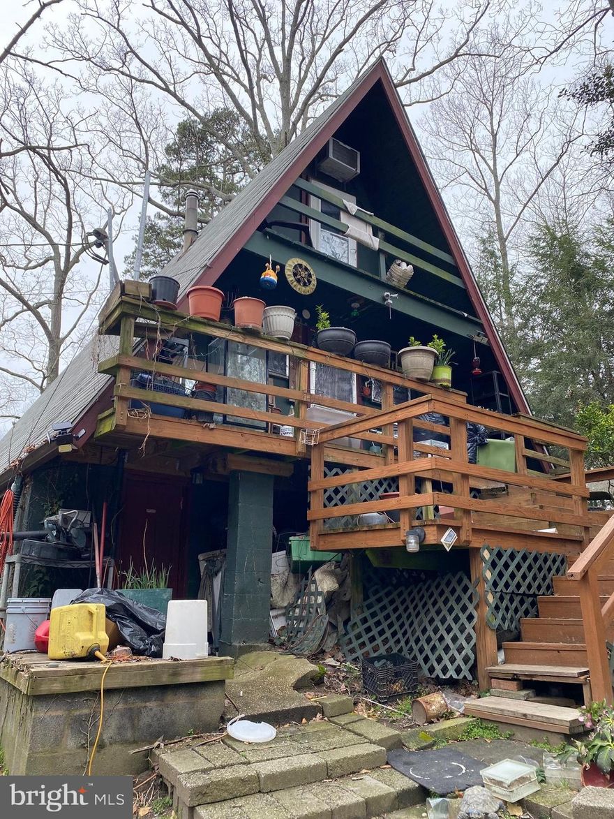 A frame home ready for you to love and make your own. House does need some work but the benefit will be great! Lake is just feet away from the extra lot that is included in the sale. Priced well for you to do projects and make it shine.