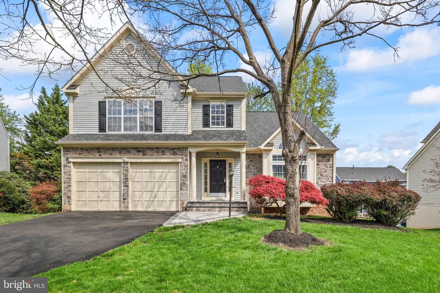 Welcome to this stunning single-family home nestled on a quiet cul-de-sac, offering exceptional curb appeal and thoughtfully designed living across three finished levels. This beautifully updated residence features 4 bedrooms, 3.5 bathrooms, and a spacious 2-car attached garage.

A charming paver stone walkway and inviting front porch set the tone as you enter. Inside, you’ll find nearly $150,000 in upgrades and fresh paint throughout. The open-concept layout is highlighted by a dramatic two-story foyer with a wood staircase and elegant metal balusters, gleaming hardwood floors, tall ceilings, and formal living and dining rooms.

The gourmet kitchen boasts granite countertops, a breakfast bar, and a sunny breakfast area. Just off the kitchen, the cozy family room with a gas fireplace opens to a deck—perfect for outdoor entertaining and weekend barbecues.

Upstairs, enjoy hardwood floors throughout, along with three generously sized bedrooms and two full bathrooms. The spacious primary suite offers dual closets and a beautifully updated, spa-like en-suite bathroom featuring a freestanding soaking tub, dual vanities, and a seamless glass shower.

The finished lower level provides incredible flexibility, with a large recreation room, abundant storage, and a fourth bedroom. It also includes a fully insulated room—ideal for music enthusiasts or a private studio. Step outside to a serene backyard complete with a patio, perfect for relaxing or entertaining.

Recent upgrades include:

Driveway & front walkway (2024)
Roof, siding & gutters (2025)
Windows (2018)
Hardwood floors (2018)
HVAC (2019)
Water heater (2021)
Primary bathroom (2023)
Upper hallway bathroom (2025)

Located in the highly sought-after Potomac Lakes community, residents enjoy a wealth of amenities along with convenient access to shopping, dining, and more.