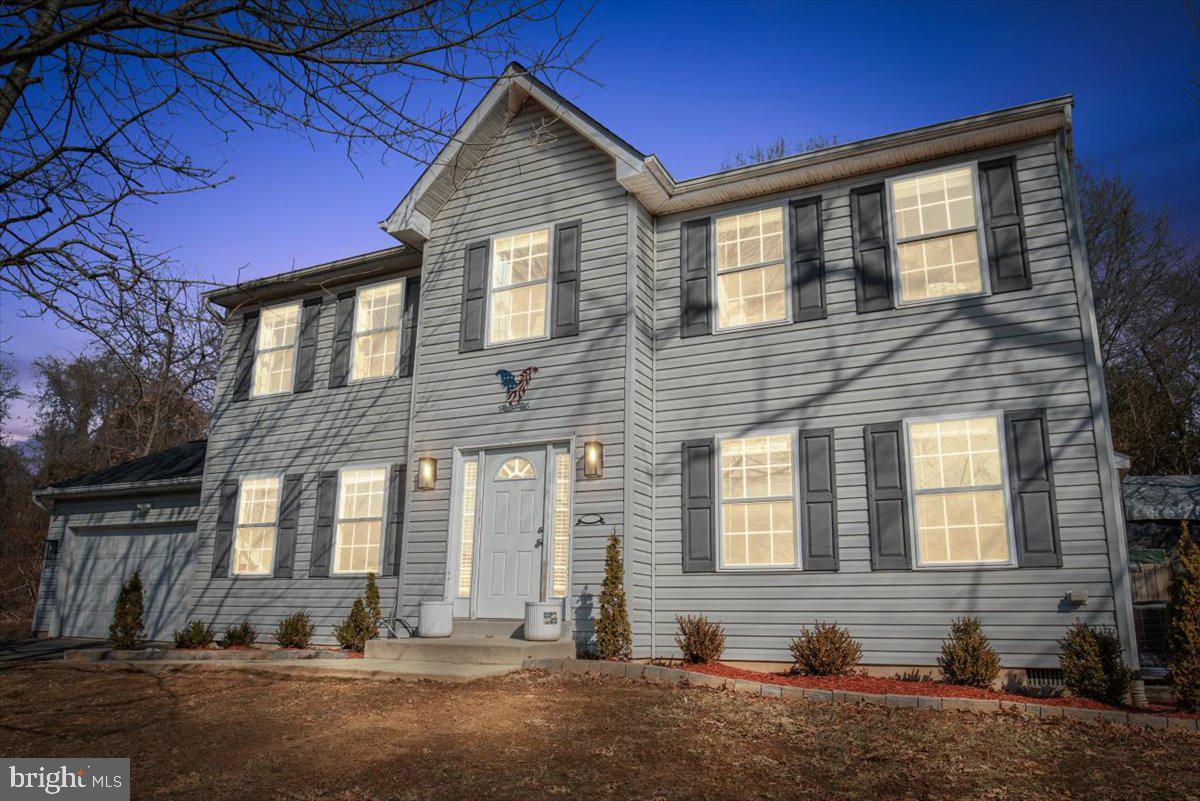 Welcome to this charming 4-bedroom, 2.5-bathroom home, situated in the peaceful, waterfront community of Cliffton on the Potomac. With more than 2,300 square feet of living space, this home is ready to make lasting memories. A brand-new roof (installed in November 2024) provides added peace of mind.
The main level is designed for both productivity and relaxation, with a private office at the front of the house and a spacious, open-concept eat-in kitchen that flows into the family room. A half bathroom on the main level adds convenience for guests. The smart floor plan ensures ample space for everyone, and the fully fenced backyard offers privacy along with a deck perfect for evening relaxation.
Upstairs, the primary bedroom features an ensuite with a soaking tub and walk-in closet. Three additional bedrooms and a second full bathroom complete the upper level, along with a laundry room—making chores a breeze!
Located just minutes from the Potomac River, this home offers the perfect blend of serenity and convenience. You’re also ideally situated with easy access to the new Harry Nice Bridge, connecting you to King George, VA in less than 15 minutes or the Town of La Plata in less than 20 minutes for shopping and dining.