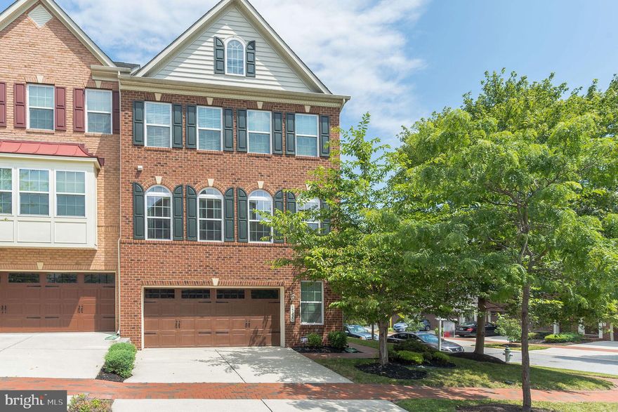 SEE VIDEO ATTACHED TO THIS LISTING.  ALL VISITORS MUST WEAR GLOVES AND ADHERE TO COVID-19 GUIDANCE. Beech Tree Stunner! Welcome home to this modern and spacious 3BR+Den, 2 full BA, and 2 HB Townhouse located in the beautiful Beech Tree East Village community in the crown jewel of Prince George's county residential living, Beech Tree! The main level features an open floor plan that maintains the clearly defined living spaces, accented by the gleaming hardwood floors, recessed lighting, 9ft ceilings, and serene views of the community off of the spacious deck. The gourmet kitchen is made for cooking big meals and comfortably hosting family and friends, the spacious island, granite countertops, and stainless steel appliances complete the package! The kitchen opens up to and includes a flex dining space large enough to accommodate a full-size table, and flows to the formal living room, bonus sunroom bump out and private, rear deck. The upper level features 3 bedrooms and 2 full baths, anchored by the master suite that includes a bonus sitting area over the bump-out, walk-in closets and classic decorative columns. The master bath includes a soaking tub, a separate shower, dual vanities, and thoughtful finishes. The entry-level of the home offers an additional full bath, den and family room with walkout to backyard, and access to the attached 2-car garage. This home has access to all the Beech Tree Community amenities including pool, tennis, tot-lots, and walking trails and community center.