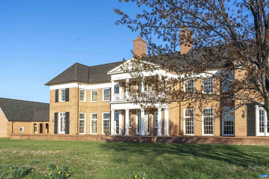 Nestled at the end of a tranquil country lane, this exceptional residence is situated in one of the most serene and picturesque locales of Albemarle County. The 50-acre property offers a good mix of hayground/pasture and hardwoods, ideal for those seeking a peaceful retreat away from the hustle and bustle of city life, while still being close to amenities. The Alexander-Nicholson built residence is a great example of Georgian-inspired architecture. Constructed with oversized Virginia brick, the home exudes a timeless elegance and solidity. The residence boasts a total of 5 bedrooms with the possibility of a primary suite on the first floor. The spacious living room and dining room are situated off the kitchen, creating an inviting layout perfect for entertaining or simply relaxing with family and friends. Large windows in every room frame stunning vistas of the Virginia countryside, bringing the beauty of the outdoors in. A lower level rec room is a perfect setting for games or movies. Multiple wood-burning fireplaces. A breezeway connects the main residence to a 3-car garage. A solar field array offsets electricity and powers a vehicle plug-in. Fiber optic internet. River access possible with additional acreage.,Maple Cabinets,Solid Surface Counter,Wood Cabinets,Fireplace in Den,Fireplace in Family Room,Fireplace in Study/Library