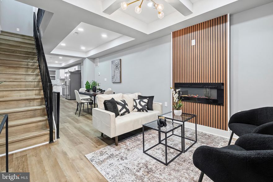 Get ready to embark on your new rental journey in Broadway East area. With lots of upcoming renovations; to include your next door neighbor, this community has so much to offer. The stylish exterior is only a glimpse at what you will experience upon entry. The warm inviting living room boasts a lovely fireplace, large double windows and a spacious dining room as you make your way to the kitchen.  Enjoy brand-new state of the art appliances, unique pendant lighting and a generously sized island that can be used as a table, just add a few bar stools. This kitchen features adequate cabinet space, a view of the privately fenced backyard and additional storage space. 

Your fully finished basement houses the washer and dryer, lovely full bathroom and a third bedroom/office/playroom- whatever suites your needs. Get creative in the open space located at the front of the basement, an opportunity  to create a cozy lounge area. 

The top level is a true must-see with a primary bedroom that has another full bathroom and just down the hall you'll find the second bedroom and a spa-like bathroom located in the hallway. 

We happily welcomed voucher holders, pets on a case by case basic within this smoke-free, move-in ready home!!! Come see for yourself, wouldn't want you to miss out.