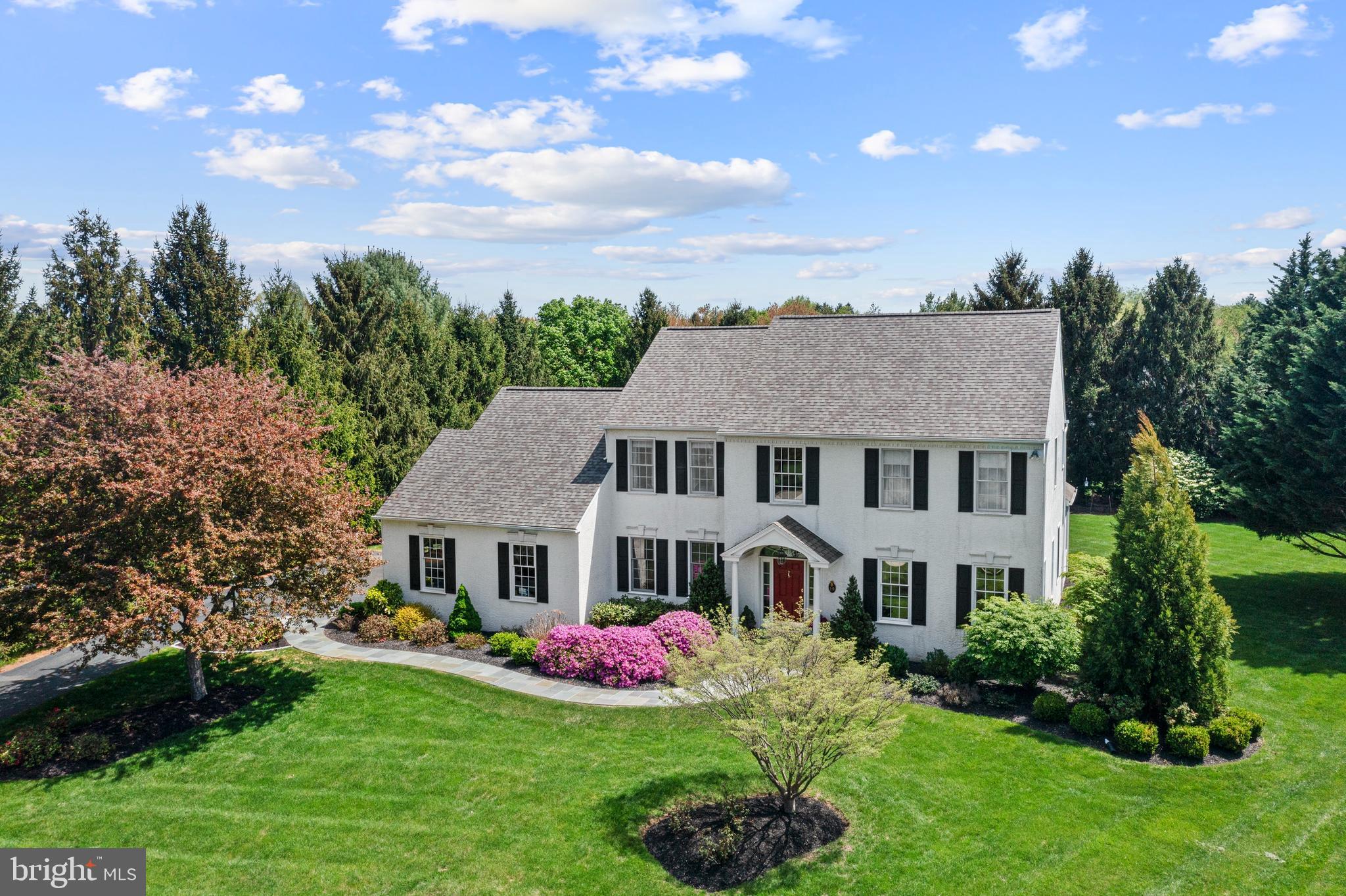 Welcome to 19 Clover Mill Lane . The One You’ve Been Waiting For. Nestled in the highly desirable Wyckfield community in Malvern, this stunning home offers over 5,200 square feet of beautifully finished living space on a premium level lot. From the moment you arrive, the remarkable curb appeal and inviting slate walkway set the tone for the thoughtfully expanded and tastefully renovated interior. The home features a newly expanded family room with vaulted ceilings, a cozy gas fireplace, and a custom wet bar, creating the perfect setting for both entertaining and everyday living. The updated kitchen is equipped with modern finishes and high end appliances, seamlessly blending style and function. Upstairs, the primary suite boasts a brand-new spa-like bathroom, while the second floor also includes a newly renovated full hall bath. The home also offers an added powder room on the main level, an expanded and upgraded mudroom and laundry area, and a fully finished basement complete with an additional full bathroom. Outdoor living is just as impressive, with a new slate and stone patio offering a serene space for relaxation and entertaining. The newly paved driveway and meticulous exterior improvements further elevate this home’s appeal. Located in the award winning Great Valley School District, this property is within walking distance of the Chester Valley Trail, Battle of the Clouds Park, and the brand-new Great Valley Community Center. Just minutes from Malvern Borough, Exton Main Street, Wegmans, Target, and major routes including Route 202, Route 30, and the PA Turnpike, you’ll enjoy unparalleled convenience with easy access to multiple SEPTA train stations for commuting to Philadelphia or New York City. Tucked away on a private cul-de-sac, yet close to everything, this home truly offers the best of both worlds; comfort, convenience, and an exceptional community. Don’t miss your chance to make 19 Clover Mill Lane your forever home.