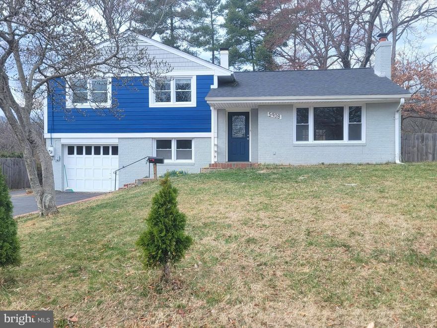 Welcome to 5908 Amelia Street! Split-level home with a very spacious layout. Home features an inviting kitchen with pendant lighting and granite countertops, cozy living area with parquet flooring and a fireplace as the main focal point of the room. Generously sized bedrooms with hardwood floors on upper level.  Walk down to the recreation room with lvp floors and additional finished area with side entrance. There is an oversized driveway, recently installed Hardie board siding, and a large backyard that is the ideal setting for relaxing, gardening, or entertaining. This home is the perfect blend of comfort and accessibility. It is conveniently located within a short driving distance to Springfield Town Center, Lake Accotink Park, easy access to 395/95, 495, Express Lanes, VRE and other major routes.