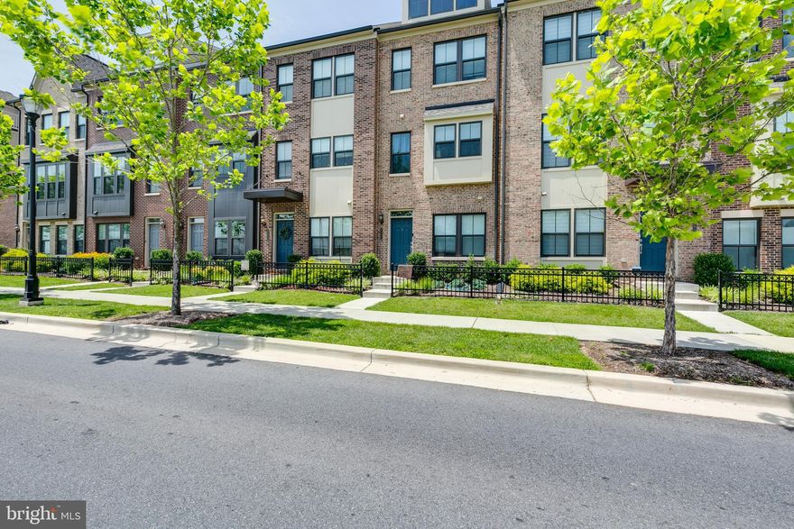 Landlord pays HOA. Contemporary townhome built in 2018 with approx. 1662 sft. of finished space is available for rent in a recently constructed beautiful urban Mixed-use Development, Riverdale Park Station (Station one). Brilliantly lit open layout perfect for entertaining! Spacious 3 BD, 2.5 BA with tall 9-ft ceilings, rear entry partially finished single car garage with shelving, picturesque elevation and community maintained flowerbed & lawn. Gourmet Chef’s kitchen with SS appliances, back-splash, double wall oven, built-in-microwave, upgraded white cabinets, oversized quartz countertops with huge island, gleaming hardwood floors, oak staircases, main level leading to beautiful deck/balcony, loft in fourth level opening to spacious terrace offering serene sunset sky views. Recommend showings with a licensed agent.

Sustainable building design with orientation to sunlight, designed for effective natural ventilation and cooling with stack effect through extra-tall stairwells, double pane low-E windows with window treatment (net & blinds), ceiling fans in all bedrooms, saves $$$ on utility bills. 

Owner recently added a third BR and a full bath at the Ground Level. While ground and main levels have wide plank hardwood floors, the third level and loft feature end-to-end carpet.

Unique features of this townhome include - Crown molding in dining area, wet bar at fourth floor, garage & first floor flush level with easy access for bikes, stroller, wheelchair, etc. into the house. Laundry Room with new large capacity Samsung Washer & Dryer conveniently located at master bedroom level. Direct ethernet access to all rooms powered by MoCA. Only 50ft across from a children's playground and Trolley trail heading to UMD and metro station.

 Priced right to own, stylish living with many conveniences offered by Riverdale Park Station such as common green lawn for outdoor socials, complimentary Uber to the metro, tot lots, secure play areas with bike & walking trails and luxury shops. Proximity to the metro (College Park Metro, Riverdale MARC and purple line) and other commute areas is an added bonus to future owners. Within a minutes away in the community are premium organic grocers, coffee shops, Hair & Nail Salons, Restaurants, food court, delivery and shipping companies and lockers, bikeshare, dentistry and more.